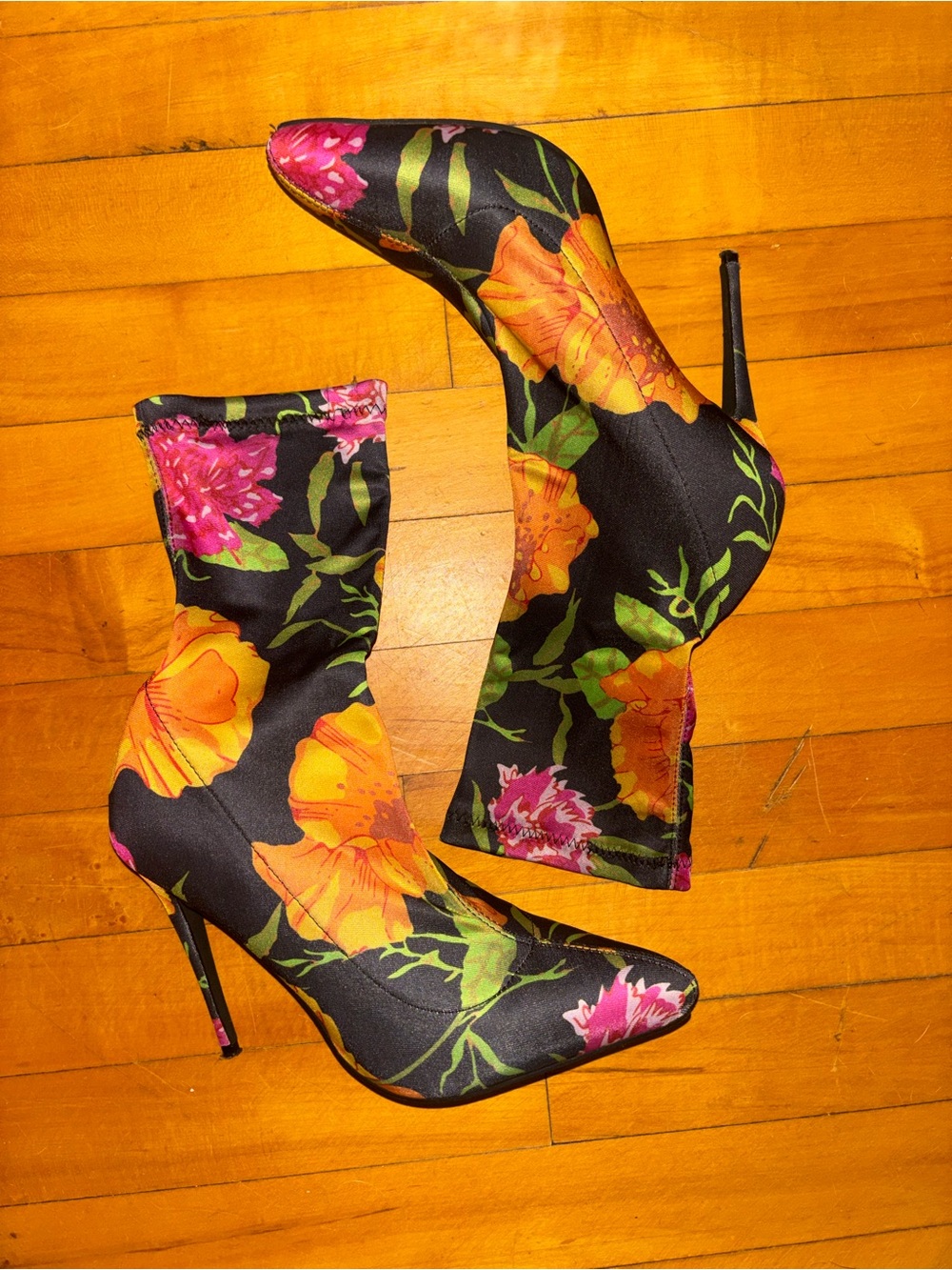 AKIRA Black Floral Stretch Sock Stiletto Booties with Orange & Pink Blossoms